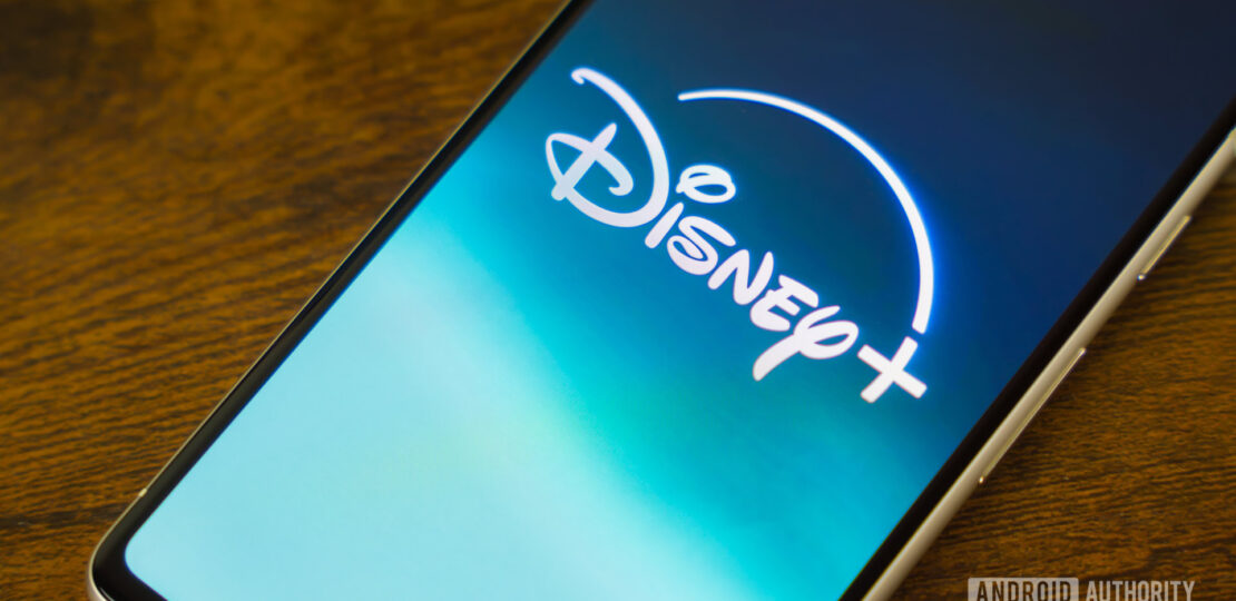 Disney-Plus-logo-on-smartphone-laying-on-side-table-stock-photo-4.jpg