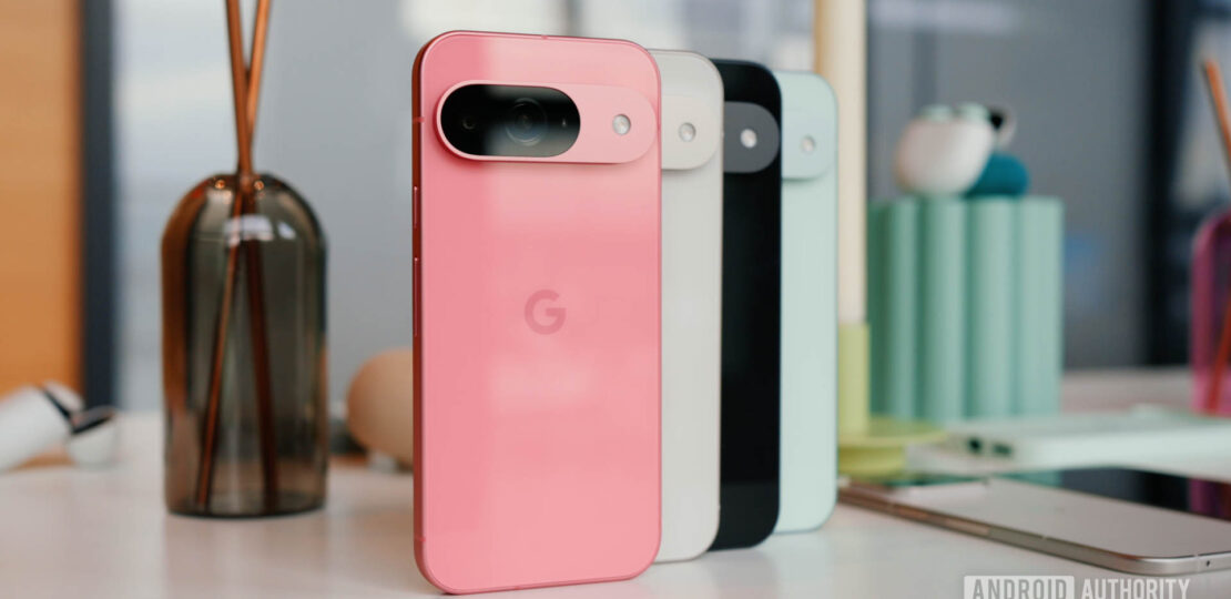 Google-Pixel-9-in-all-four-colors-standing-upright-on-a-table-in-a-row-with-the-Peony-color-at-the-f.jpeg
