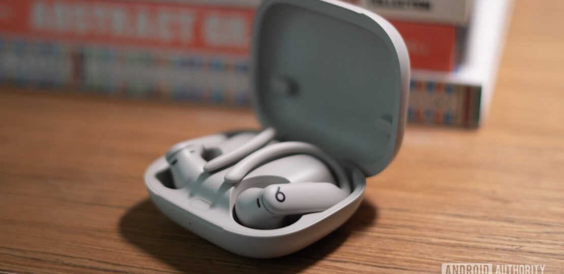 Beats-PowerBeats-Pro-2-case-open-on-bookshelf.jpg