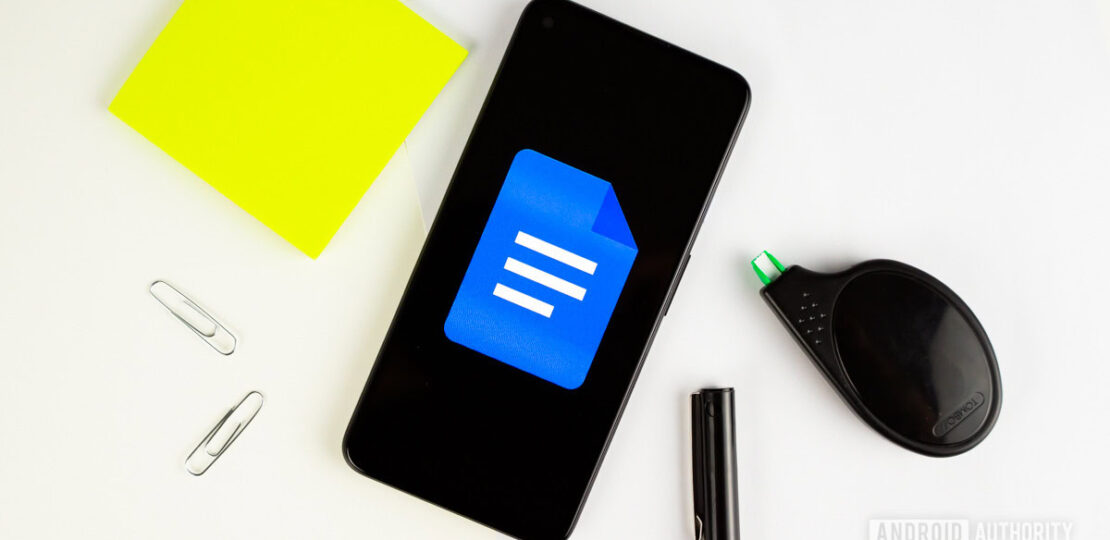 Google-Docs-logo-on-smartphone-next-to-office-gear-stock-photo-1.jpg