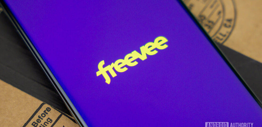 Stock-photo-of-Freevee-by-Amazon-logo-on-phone-next-to-box-3.jpg