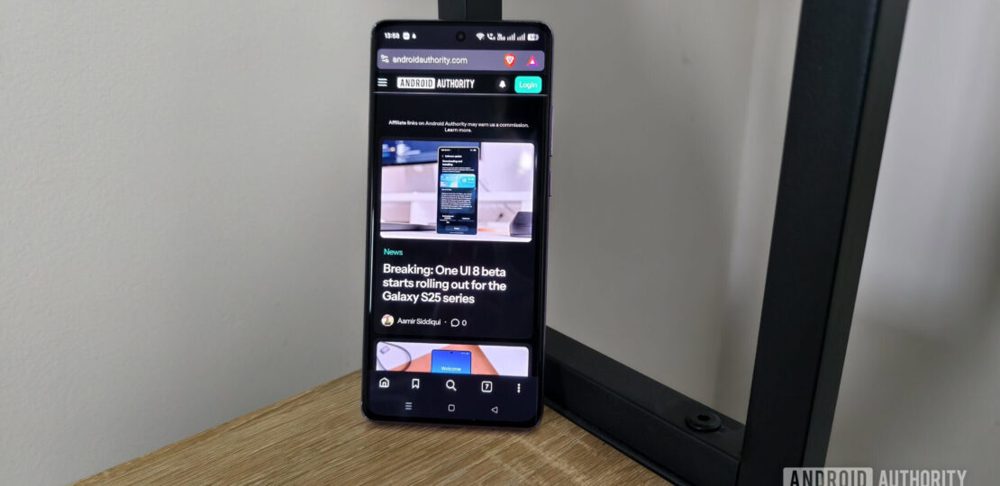 a-smartphone-showing-the-android-authority-site-in-dark-mode-scaled.jpg